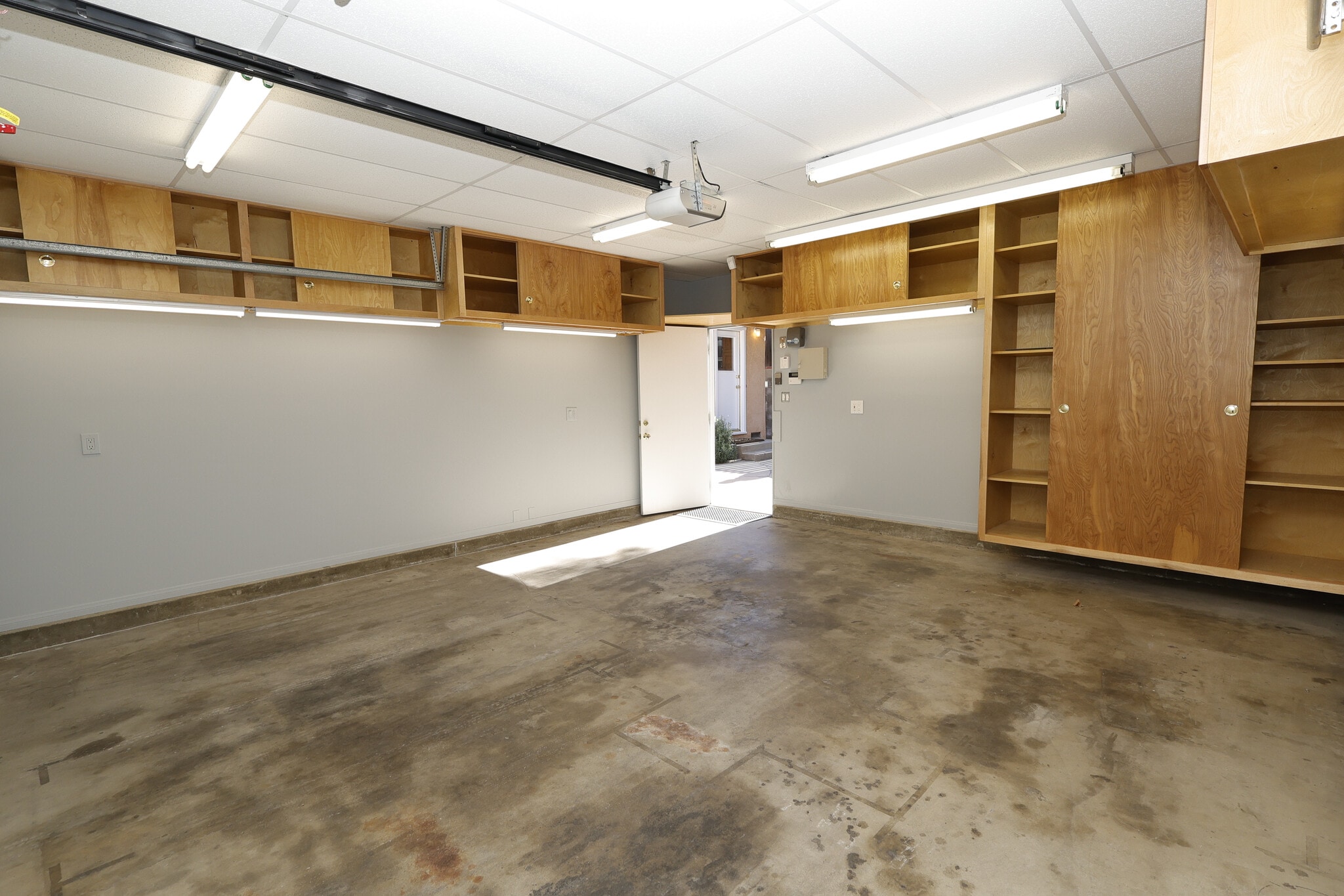 Detached two car garage with plenty of storage and lighting. - 4831 Canoga Ave