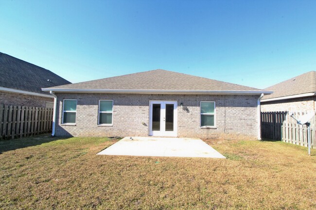 Building Photo - Beautiful 3/2 Brick Home in Pace with Mode...