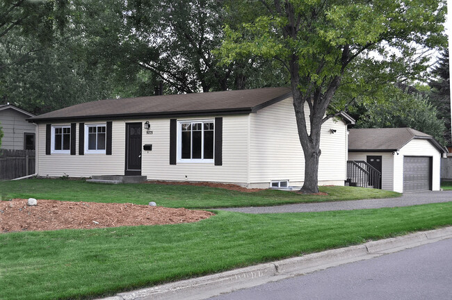 Wrap around driveway and garage/yard - 9275 W 22nd St