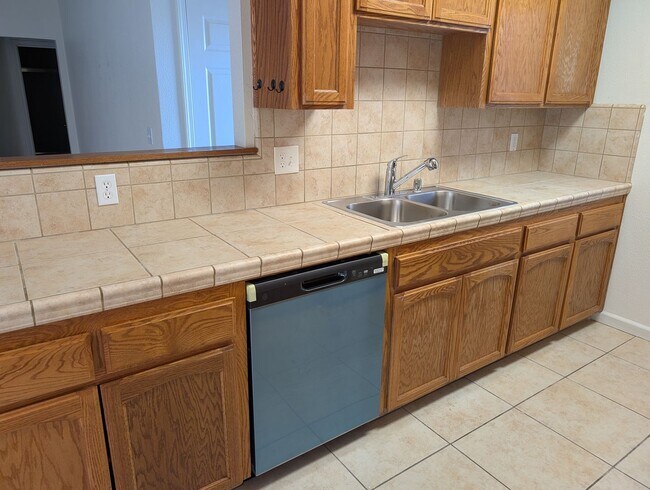 Building Photo - Remodeled and updated home offering nice amenities.