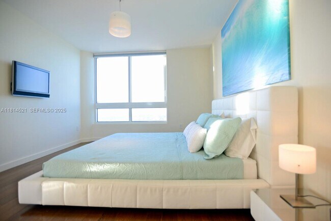 Building Photo - 6365 Collins Ave