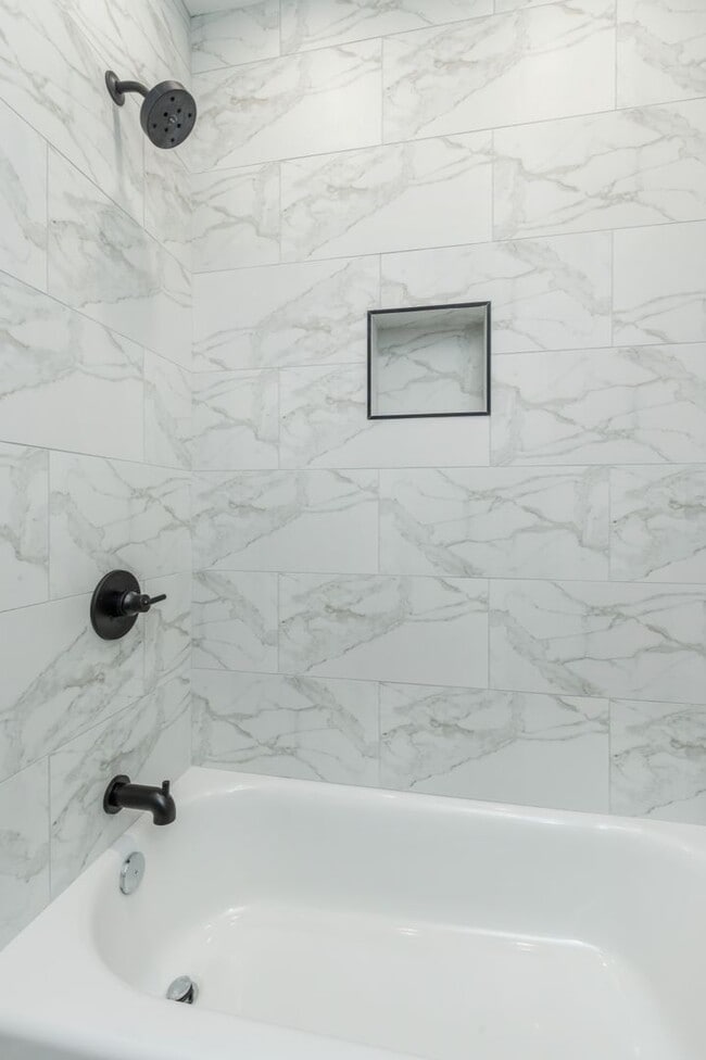 Building Photo - New 2 Bedroom Apartment in Modern Building! Now Offering 1 Month FREE on a 12 month lease!