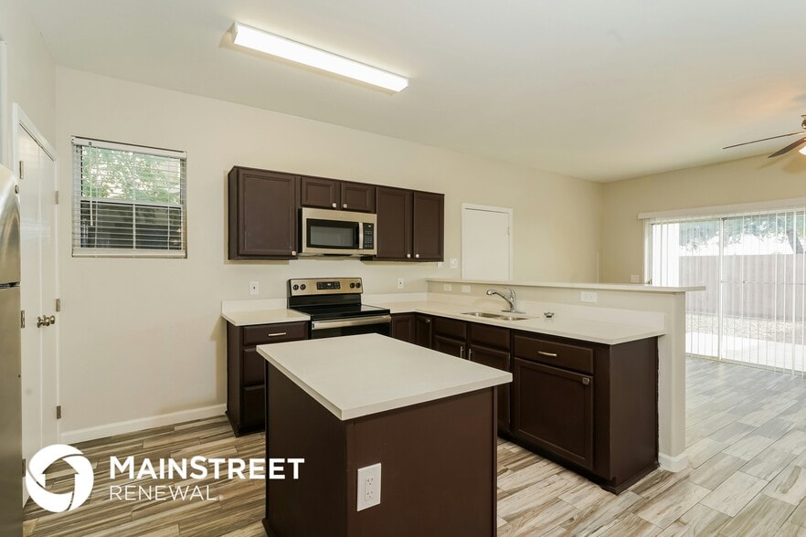 Building Photo - 11954 W Belmont Dr