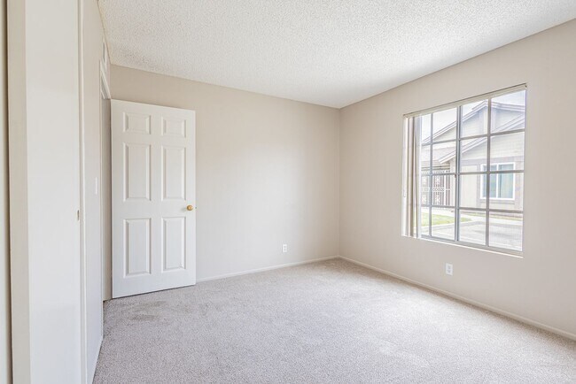 Building Photo - Spacious Single-Story 3-Bedroom Condo with Private Patio and 2-Car Garage