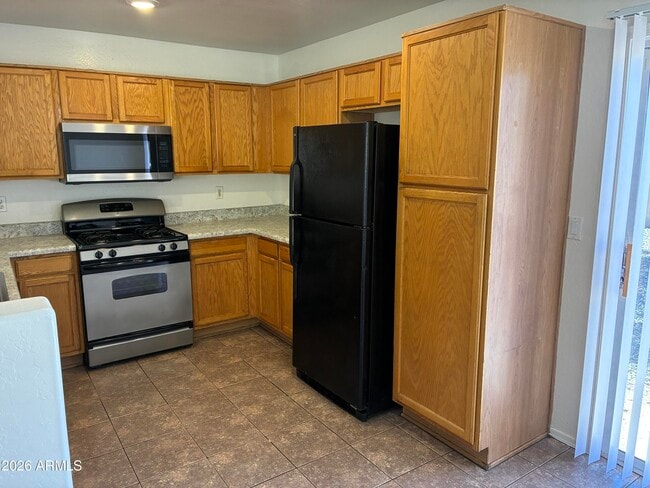 Building Photo - 6027 W Encinas Ln