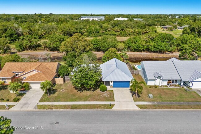 Building Photo - 3390 Floral Palm Blvd