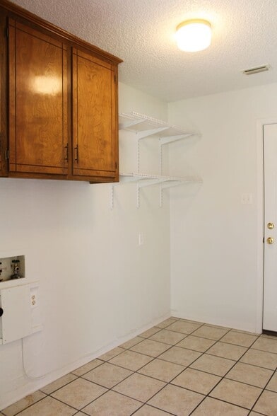 Utility Room with W/D connections and room for a freezer - 1413 Center Dr