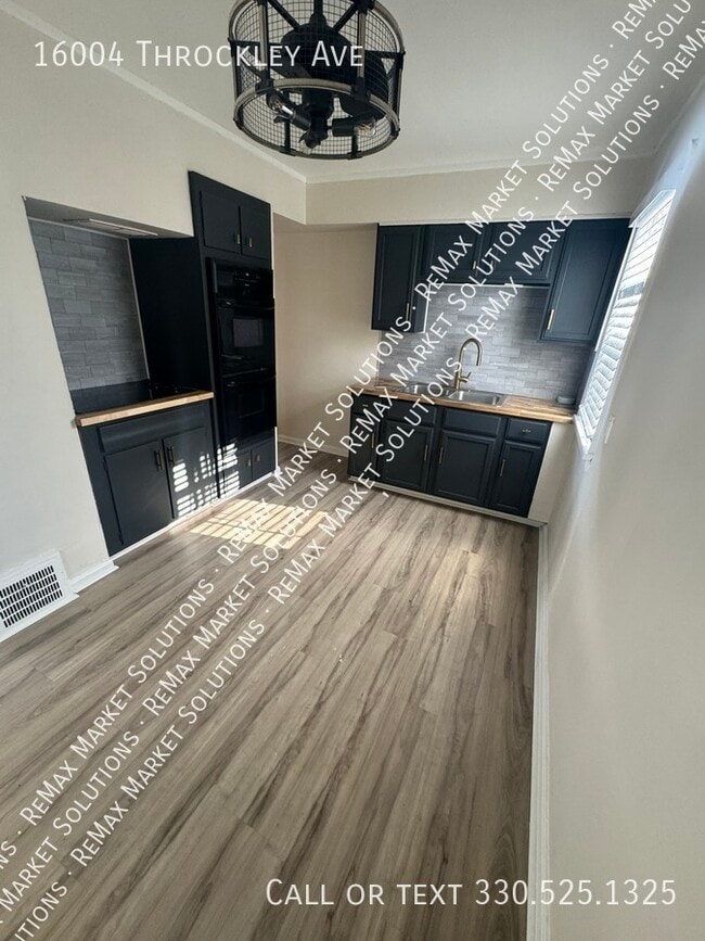 Building Photo - 16004 Throckley Ave