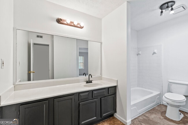 Building Photo - 6449 Pinebark Way