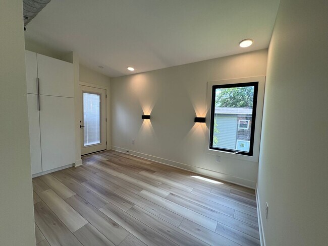 Building Photo - Vaulted Ceilings & Hardwood Floors in This Charming Indianapolis L