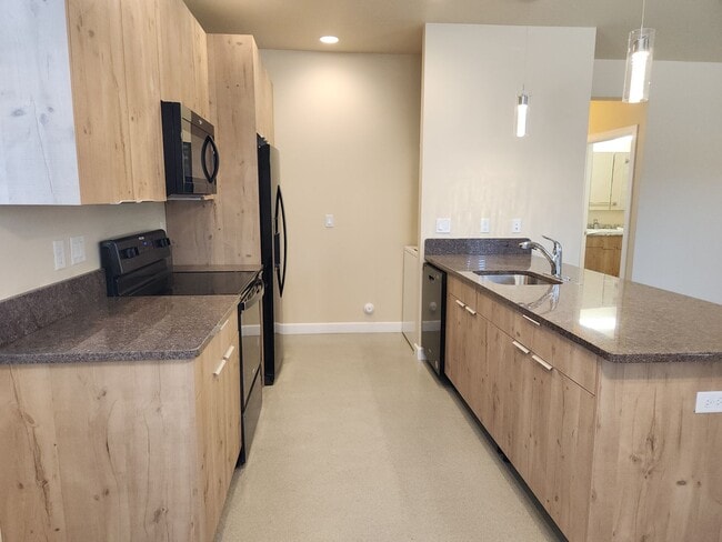 Building Photo - NEW Bison Cove E4 End Unit Now Available