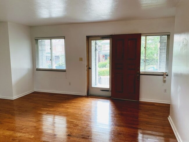 Building Photo - Check out this Totally Updated First Floor Duplex! 2BR+Den