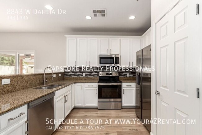 Building Photo - 8843 W Dahlia Dr