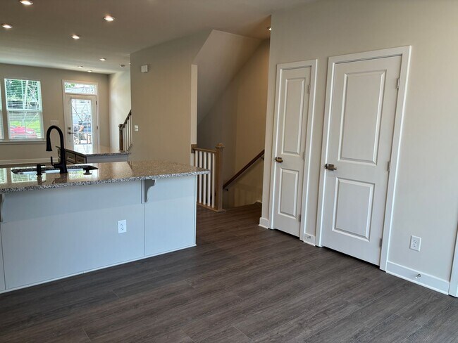 Building Photo - Pristine, move-in ready Townhome located i...