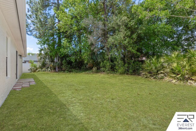 Building Photo - FULLY FENCED 3/2/2 IN THE HEART OF PALM COAST