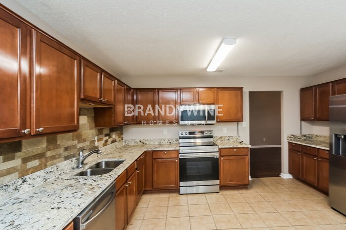 Building Photo - 6828 Kamali Ave