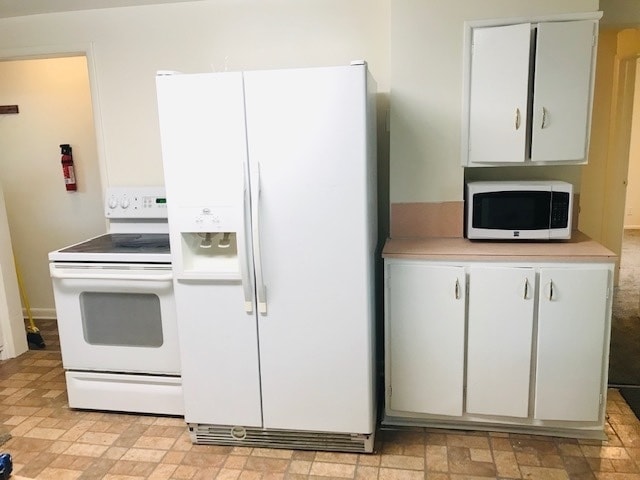 Building Photo - Beautiful home, new cabinets, updated carp...