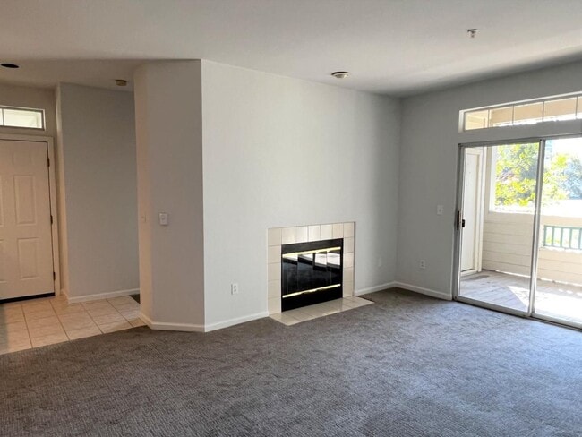 Building Photo - Spacious 2BR/2BA Redwood Shores Condo with Balcony, Natural Light & Garage Parking