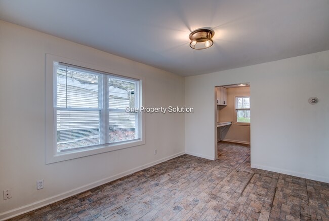 Building Photo - 1665 W 40th Ave