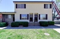 Building Photo - Rent this 2 Bedroom  1.5 bath Townhome Nea...