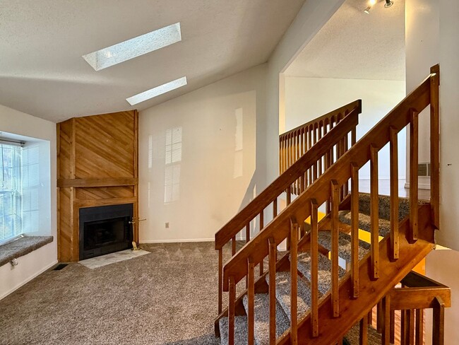 Building Photo - Open Tri-Level Townhome With Tons Of Space...