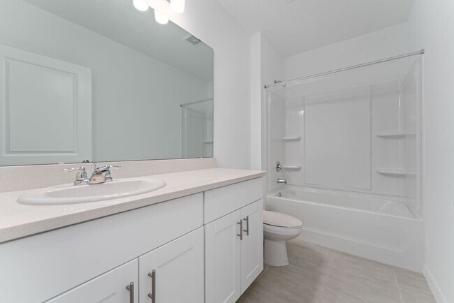 Building Photo - Almost New 4/3.5 Home with Waterview and 2...