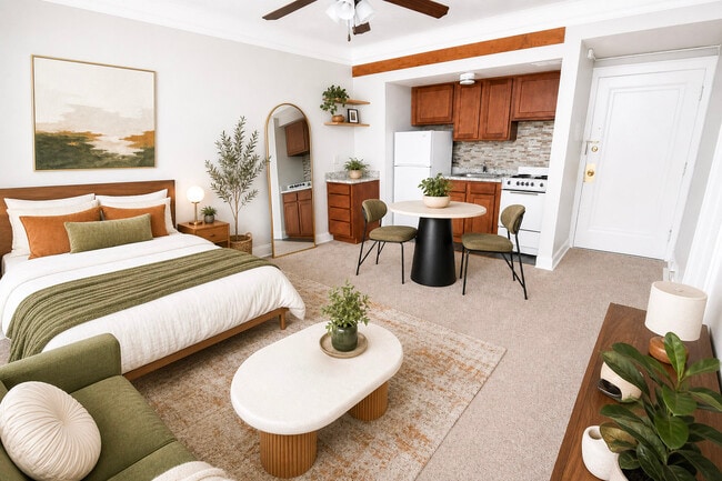Carpeted Adrian Studio - Staged - Oakland Apartments