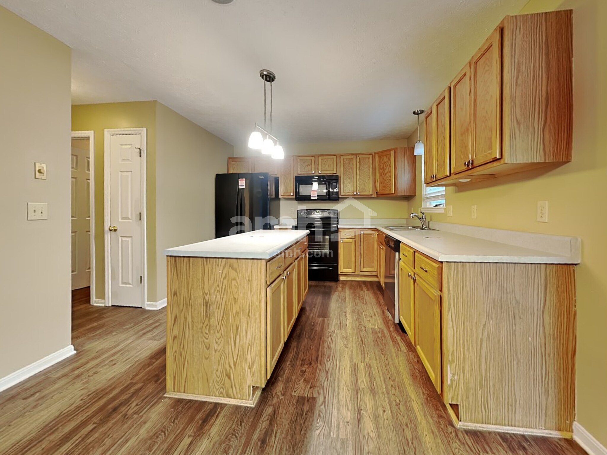 Building Photo - 8676 Woolstone Ct