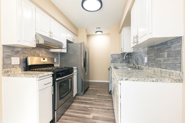 Building Photo - East 33rd Ct Duplex