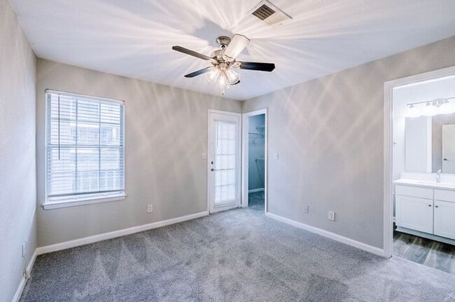 Building Photo - Spacious 2-Bedroom Elite Apartment with Private Balconies & Washer/Dryer