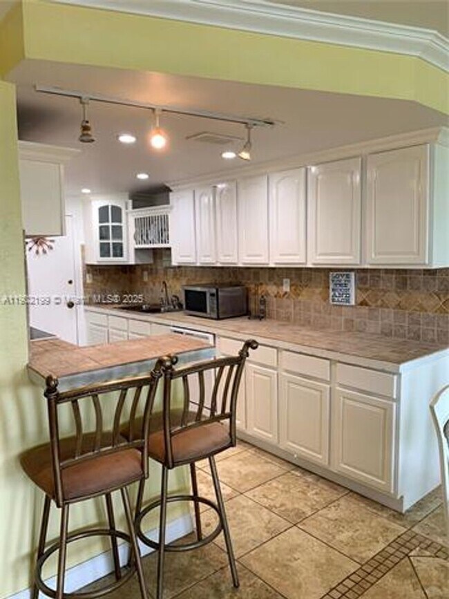 Building Photo - 5401 Collins Ave