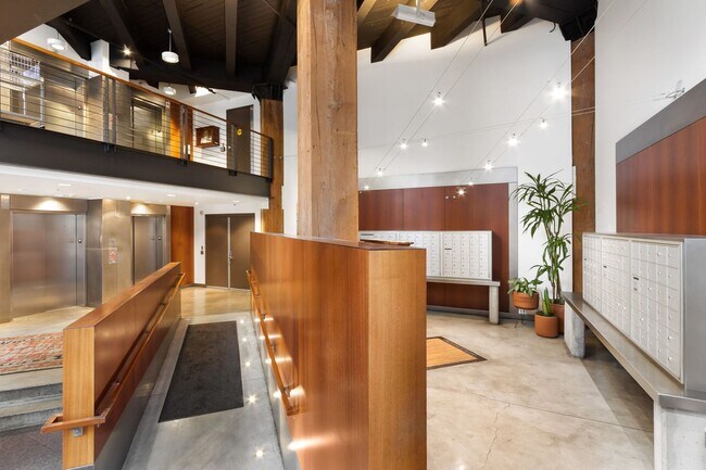 Building Photo - Chic, urban studio condo in the Pearl—Peaceful, In-unit w/d, 14-ft ceilings, deeded parking