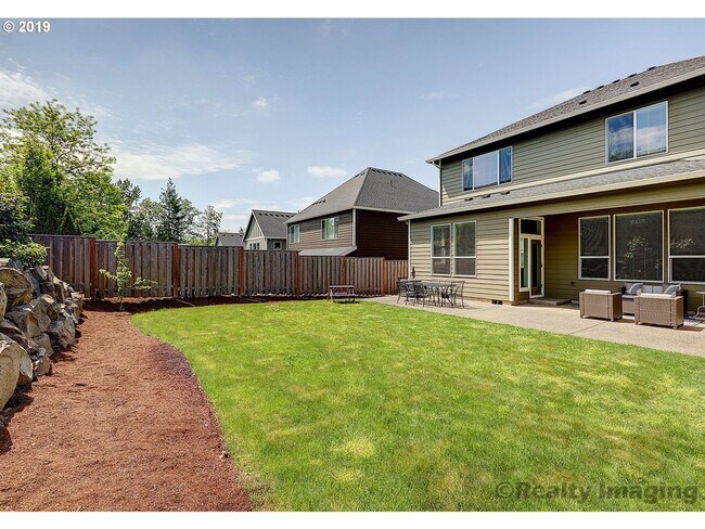 Building Photo - FOR RENT UNFURNISHED: Beautifully maintained 2015 Noyes-built home, 5 bed, 3 bath, 2 car garage w...