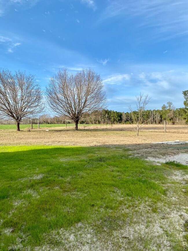 Building Photo - Amazing property! Dreamy wraparound porch!...