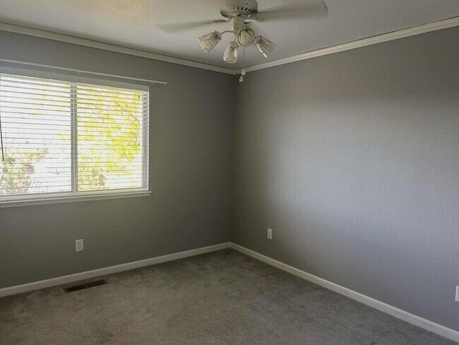 Building Photo - Welcome to this STUNNING 4-bedroom, 2.5-ba...