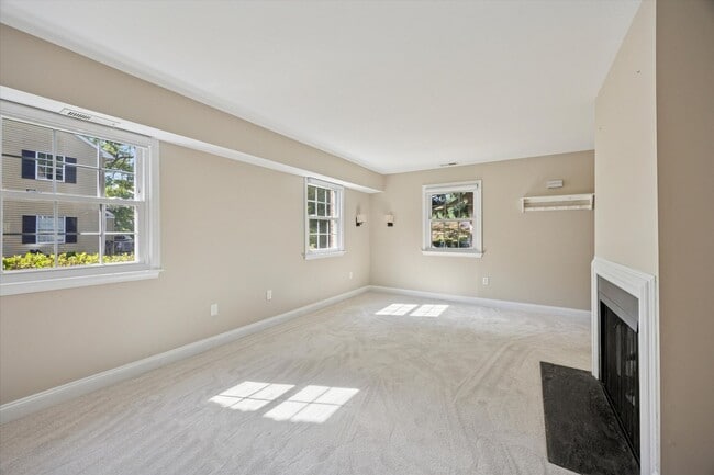 Building Photo - Available Immediately – 4 Bedroom End-Unit...