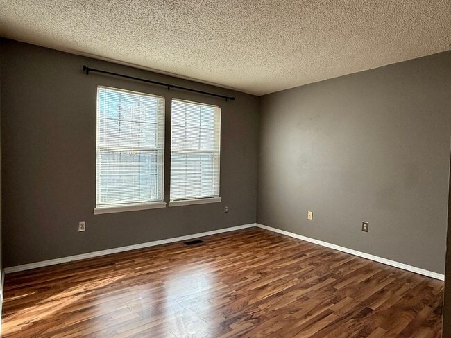 Building Photo - Open Tri-Level Townhome With Tons Of Space...