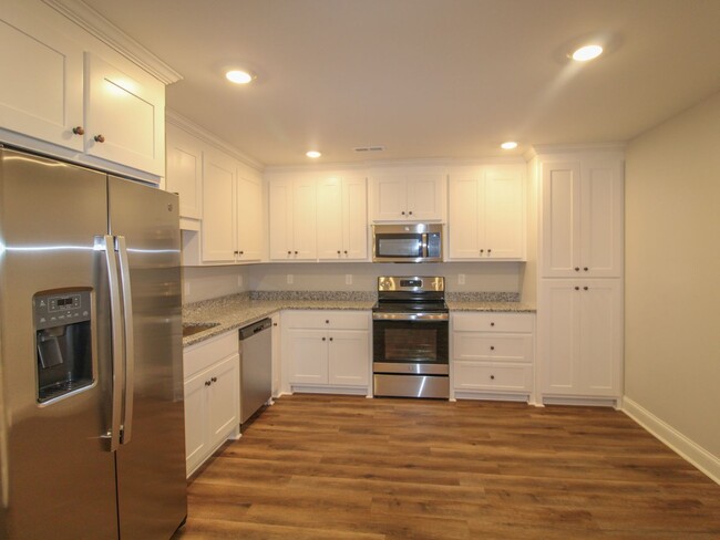 Building Photo - New 4 BR Corner Unit Townhome at Lucas Fer...