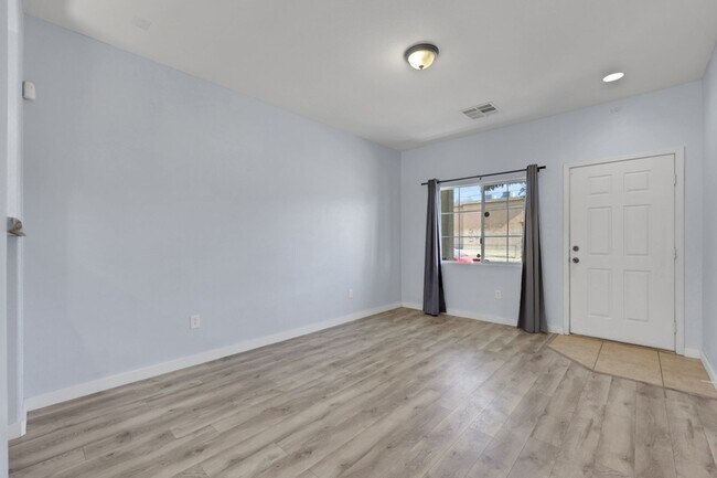 Building Photo - Updated Two-Story 3 bed/2.5 bath Home with Open Kitchen, Attached 1 Car Garage & Modern Flooring ...