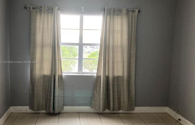 Building Photo - 10900 SW 104th St