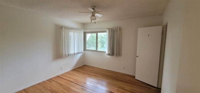 Building Photo - Classic, Midcentury 3 bedroom with Den, 2.5 bath home nestled into hillside with secluded backyar...