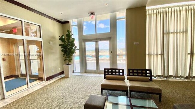 Building Photo - 16699 Collins Ave