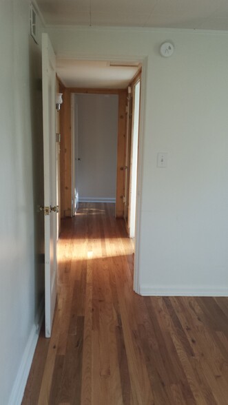 Looking from the north bedroom to the south bedroom, bath entrance on the right - 901 Country Club Ave