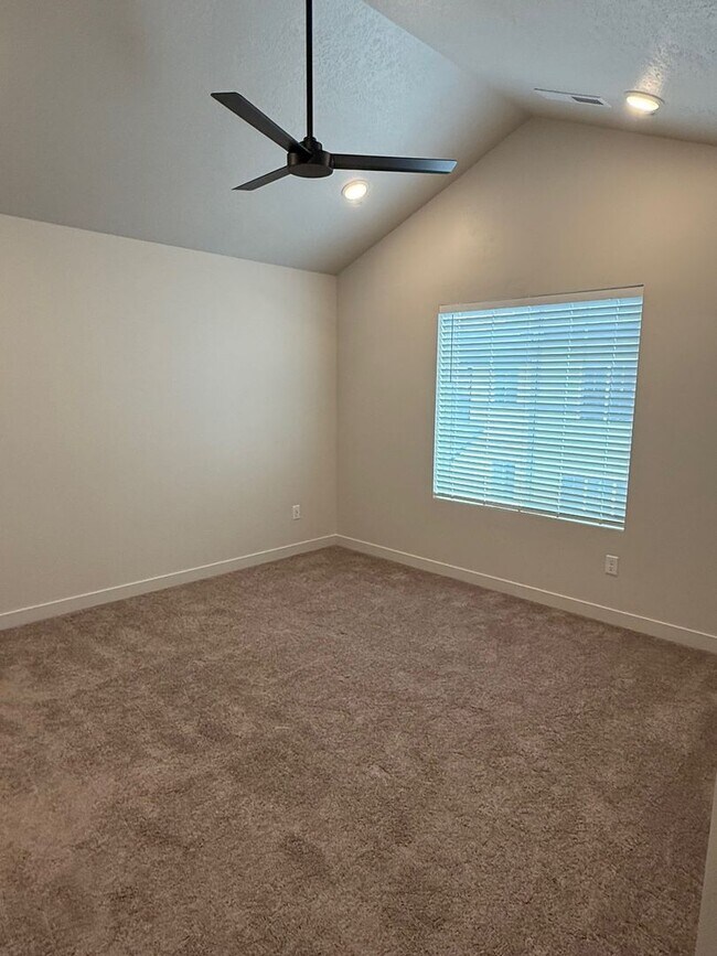 Building Photo - Half off first months rent - Beautiful townhome, construction just completed, 2 car garage, centr...