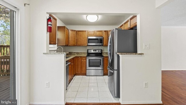 Building Photo - This stunning 3-bedroom, 2-bathroom interior townhome is sure to impress.