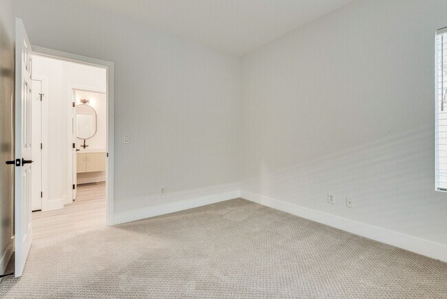 Building Photo - FULLY FURNISHED! Exudes sophistication with designer touches throughout