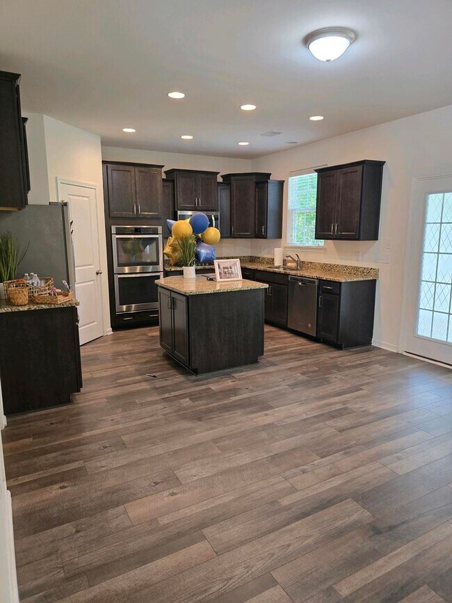 Building Photo - Spacious Elegance Meets Smart Living — 3,1...