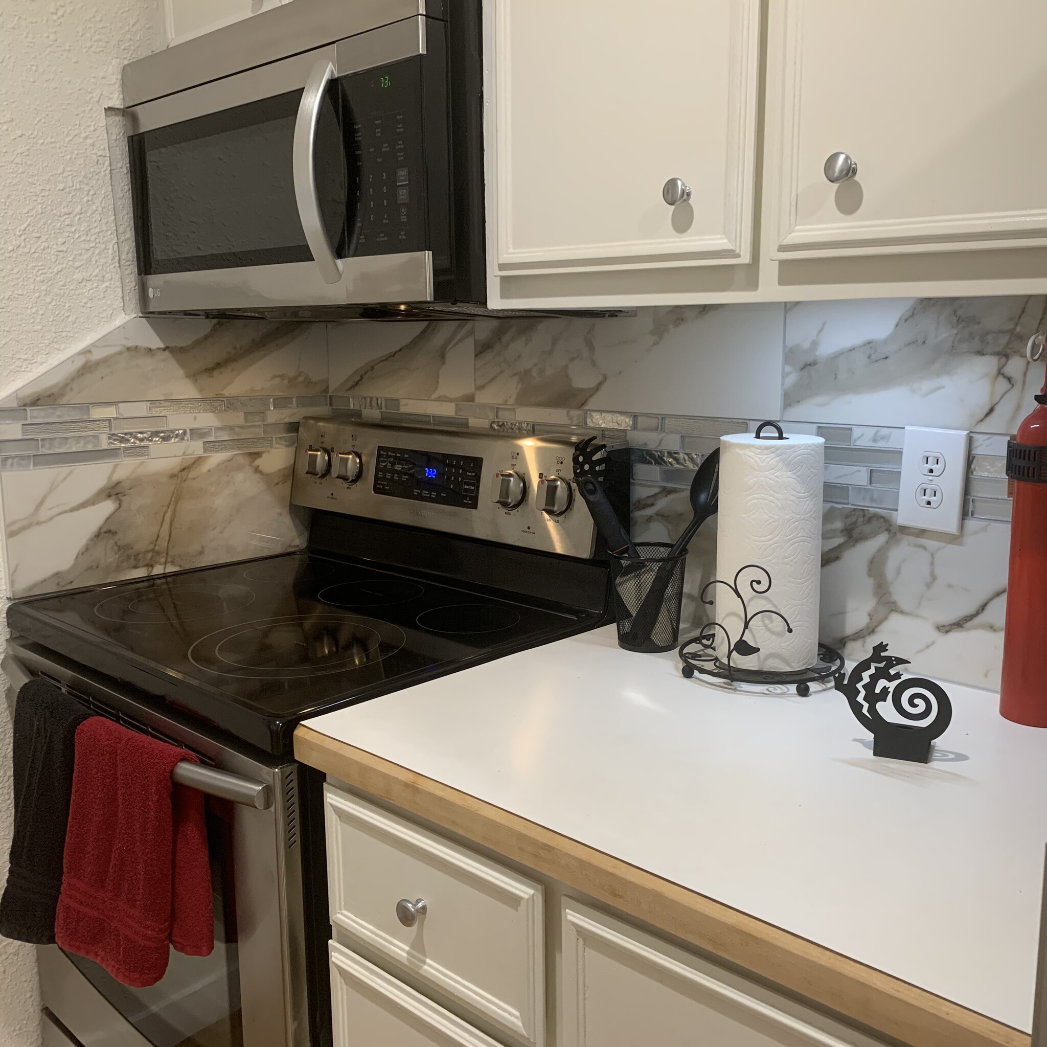 KITCHEN- SS appliances, fresh tiling, under counter lighting - 2227 Canyon Blvd