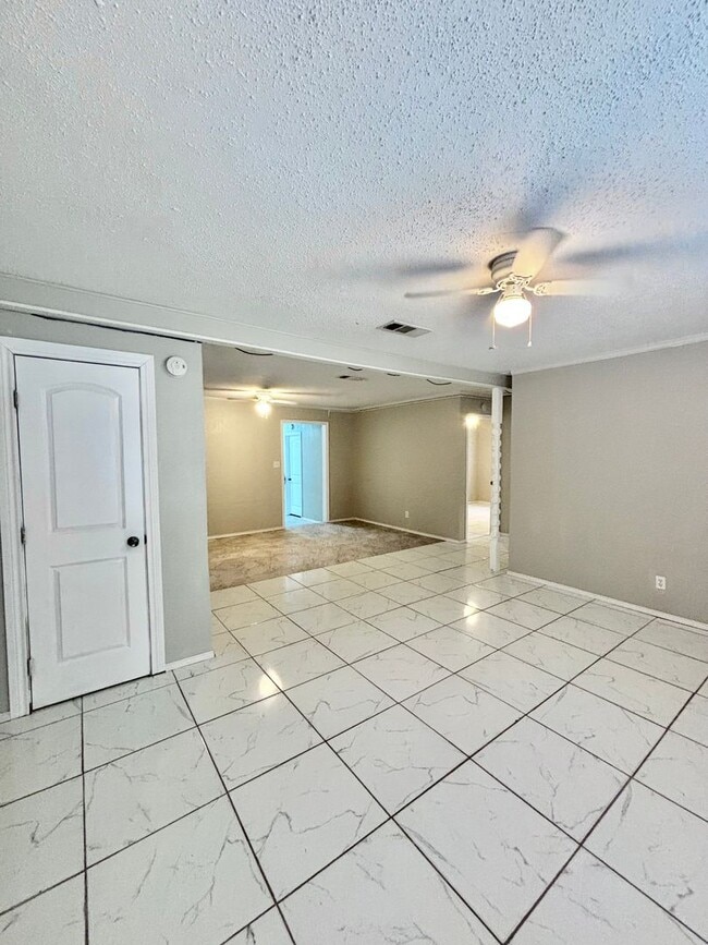 Building Photo - NOW AVAILABLE - Spacious 3-Bedroom Home + Fenced Backyard & Storage Building!