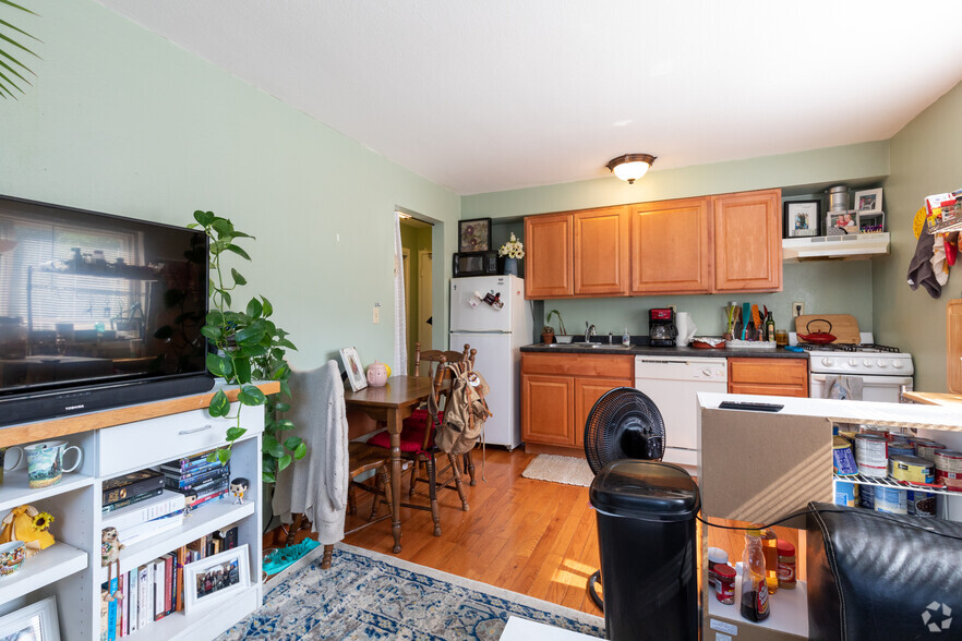 1BR, 1BA - SF - Living Room and Kitchen - Stadium Village Apartments